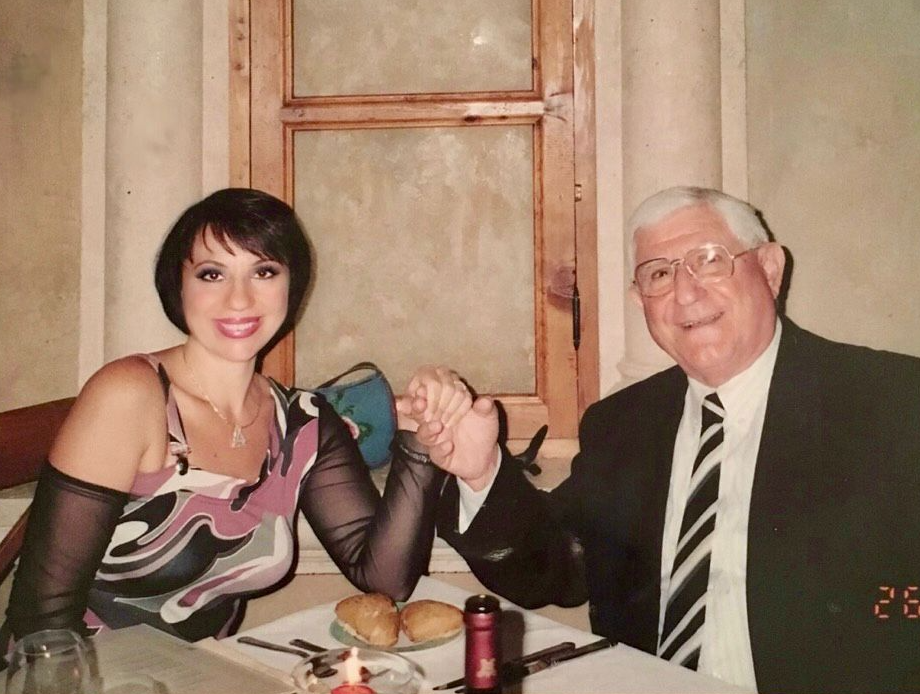 Judge Hassan Kawas sitting with his wife Mirvat Salam at a dinner table