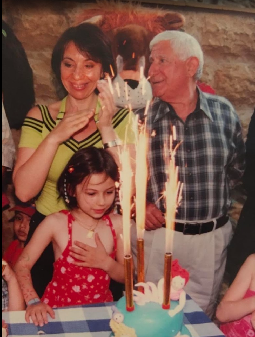 Judge Hassan Kawas with his wife Mirvat Salam and his daughter Maya during a family celebration