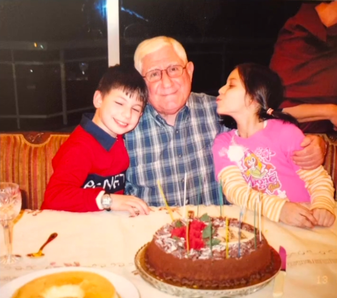 Judge Hassan Kawas with his son Ramzi and daughter Maya during a family birthday celebration