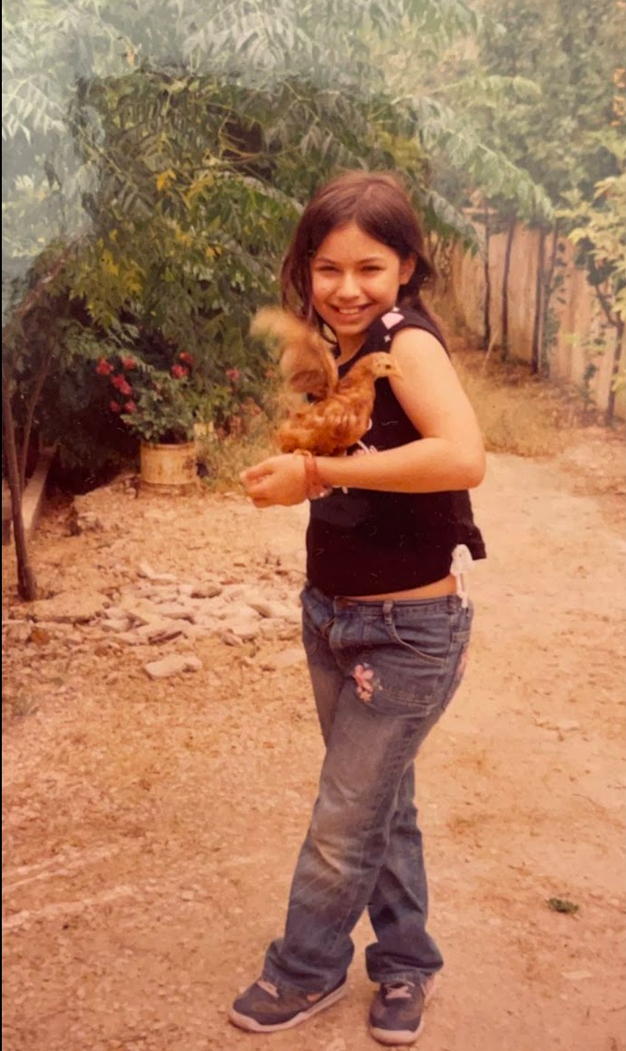 Maya Kawas, daughter of Judge Hassan Kawas, in a childhood garden photograph